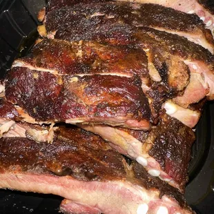 ribs in a plastic container