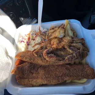 Flounder and 2 soft shells- I already had 1/2 of one! Fries, hush puppies and slaw. Everything was great- made to order!!! Worth the stop!!