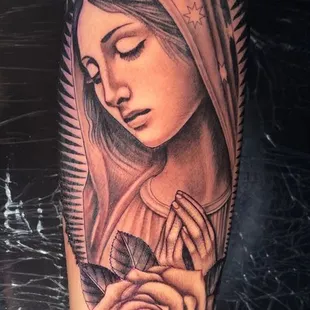 Black and gray Mary Tattoo done by Dillon at raystattoo.com