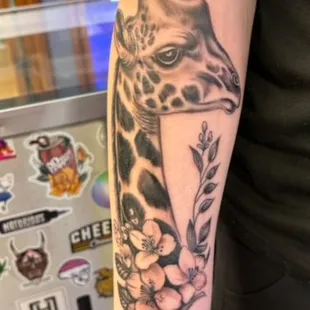 Black and gray Giraffe done by Ray at raystattoo.com