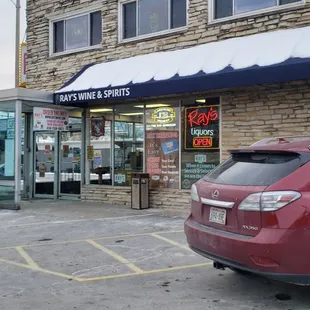 a car parked in front of a store