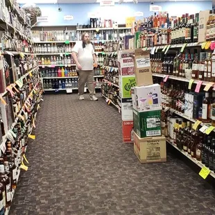 the aisle of a liquor store
