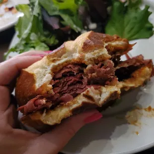 Twisted Reuben on a pretzel bun