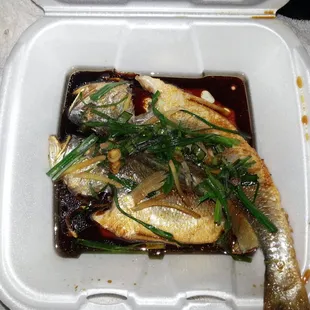 Special order sea bass. Cooked in soy and other choice flavors, served with ginger and scallions. Just watch out for the bones!