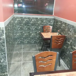 A nice little cozy spot of the main part of the dining room. There are around 6 tables and will fit maybe 20 people in all.