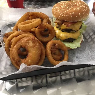 Double bacon burger with onion rings.