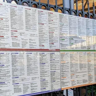 a menu on a fence