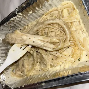 Hard clumpy Alfredo noodles and flavorless Alfredo sauce