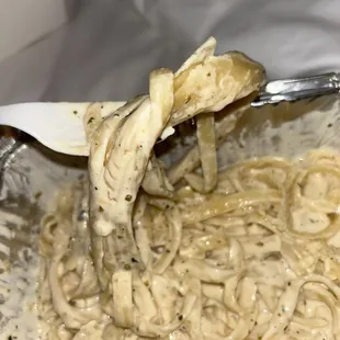 Hard clumpy Alfredo noodles and flavorless sauce