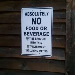 No, you cannot bring in your own water.