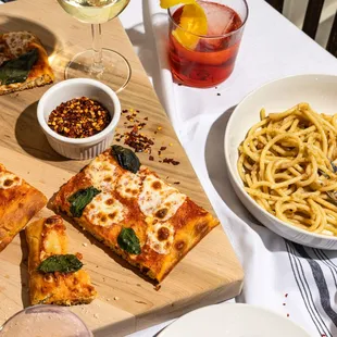 a variety of food and wine on a table