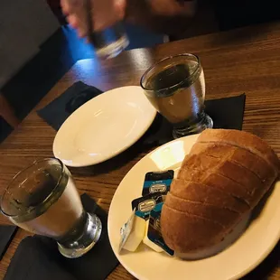 a plate of food and a glass of water