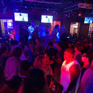 a large group of people dancing