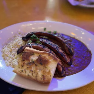 Andouille Sausage over Red Beans N Rice