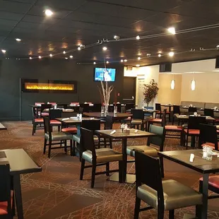 a restaurant with tables and chairs