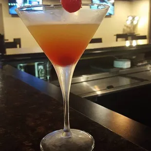 a cocktail in a martini glass