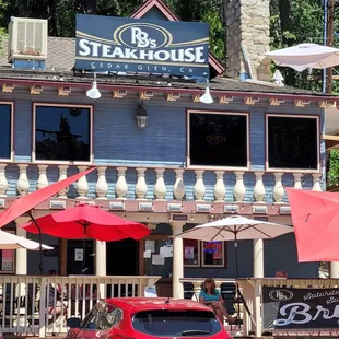 cars parked in front of the restaurant