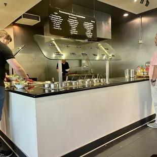 two men preparing food