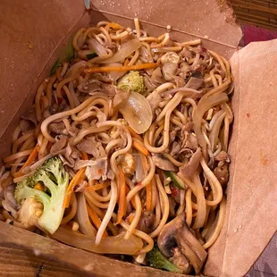 a box of noodles and broccoli