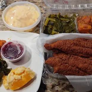 3 piece fried catfish, Yams, greens, cornbread with an extra side of Mac-n-cheese.