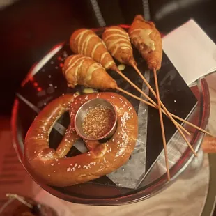 Shrimp corn dogs and soft pretzel