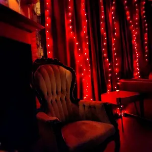a chair in a dimly lit room