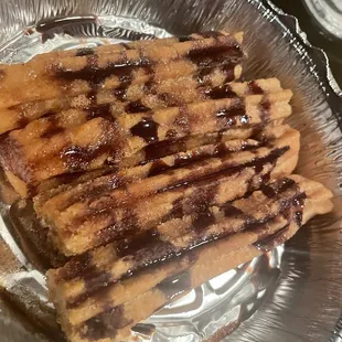 Churros. I melted some really aged crystal filled Gouda on some.  Holy shit.  It was good!!