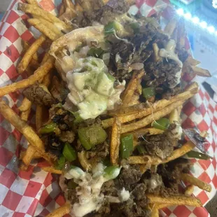 a plate of fries and a sandwich