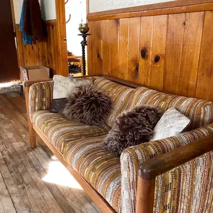 Amazing woven couch with throw pillows