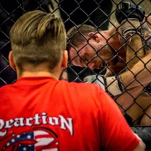 Professor coaching one of the first MMA fighters at Reaction, in his successful Pro title defense (Matt Metts).