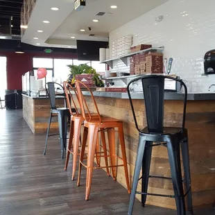 a row of chairs in a restaurant