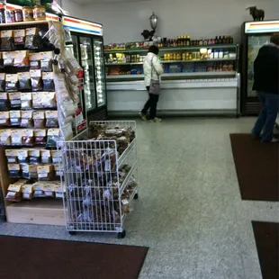 a man and a woman in a grocery store
