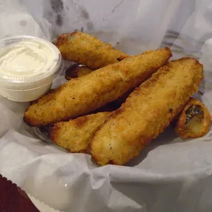 Deep fried pickles with dipping sauce.