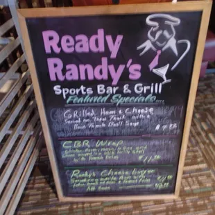 Chalk board with daily specials, front entryway.