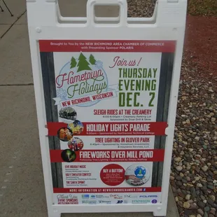 Placard sign on the front sidewalk.