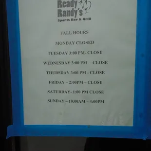 Hours of operation, front entry door.