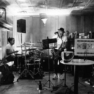 a band playing in a recording studio