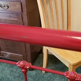 Mom's antique iron bed...painted with car paint. Scratched to the metal all over.