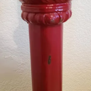 Mom's antique iron bed...painted with car paint. Scratched to the metal all over.