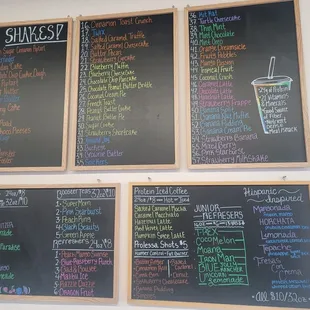 a variety of menus on a chalkboard