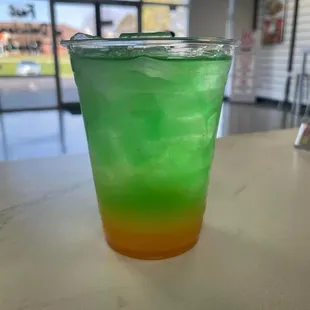 a green and orange drink