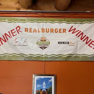 a banner hanging on a wall