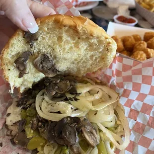 Inside of the turkey burger with onions and mushrooms.