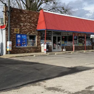  gas station with a red roof