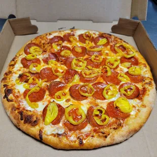 Banana pepper and pepperoni pizza