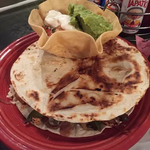 Armando's pizza! HUGE! Stuffed with shrimp, chicken, steak, peppers, onions and tomatoes. Just try to finish it.