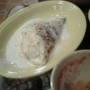 Boyfriend's chicken quesadilla with cheese.