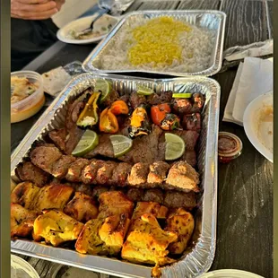 Our prized Family Combo! A delicious blend of our Koobideh, Chicken and prime meats Shish and Lamb kabobs with side add ons to enjoy!