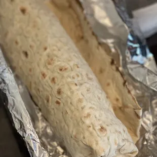 a burrito wrapped in foil