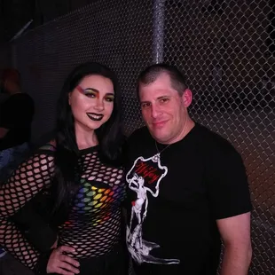 a man and a woman posing for a picture